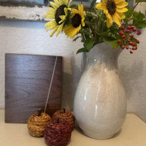Dainty line on black walnut